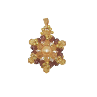 Crystal and pearl pendant with a champagne centre pearl surrounded by warm champagne faceted crystals and an outer ring of purple crystals, accented throughout with gold beads, and a gold-tone bail, photographed on a white background.