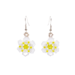 Handmade daisy flower beaded drop earrings made with white seed beads and bright yellow centre beads, with silver hook findings, displayed as a matching pair on a white background.