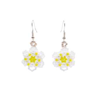 Handmade daisy flower beaded drop earrings made with white seed beads and bright yellow centre beads, with silver hook findings, displayed as a matching pair on a white background.