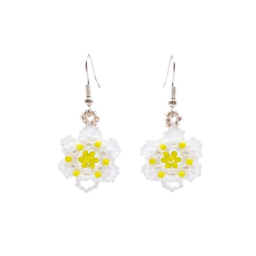 floral-earrings-main Handmade daisy flower beaded drop earrings made with white seed beads and bright yellow centre beads, with silver hook findings, displayed as a matching pair on a white background.