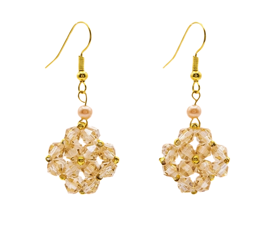 Double-layered golden crystal beaded drop earrings with pearl accent and gold ear wire, woven crystal pendant on white background
