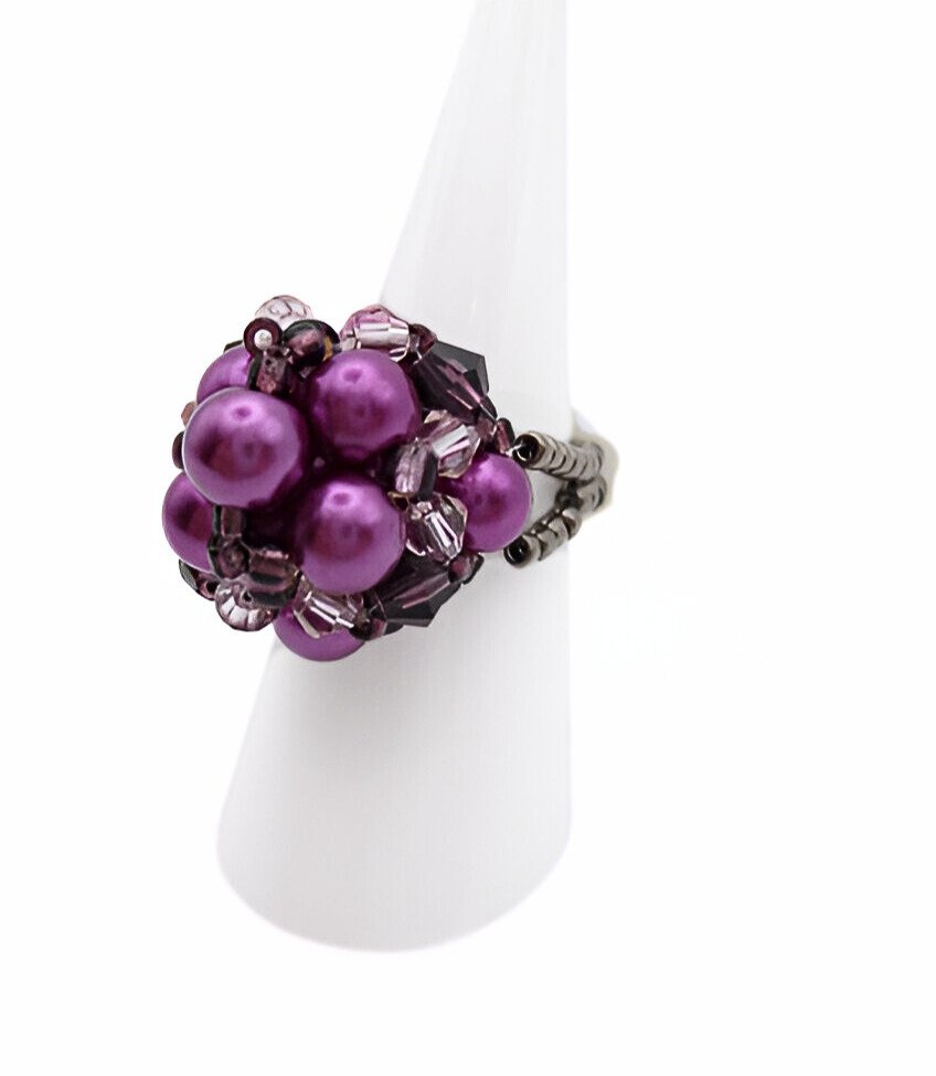 pearl-cocktail-ring-purple-side-view Side view of handmade purple pearl cluster ring with violet crystal beads and beaded band on white display stand