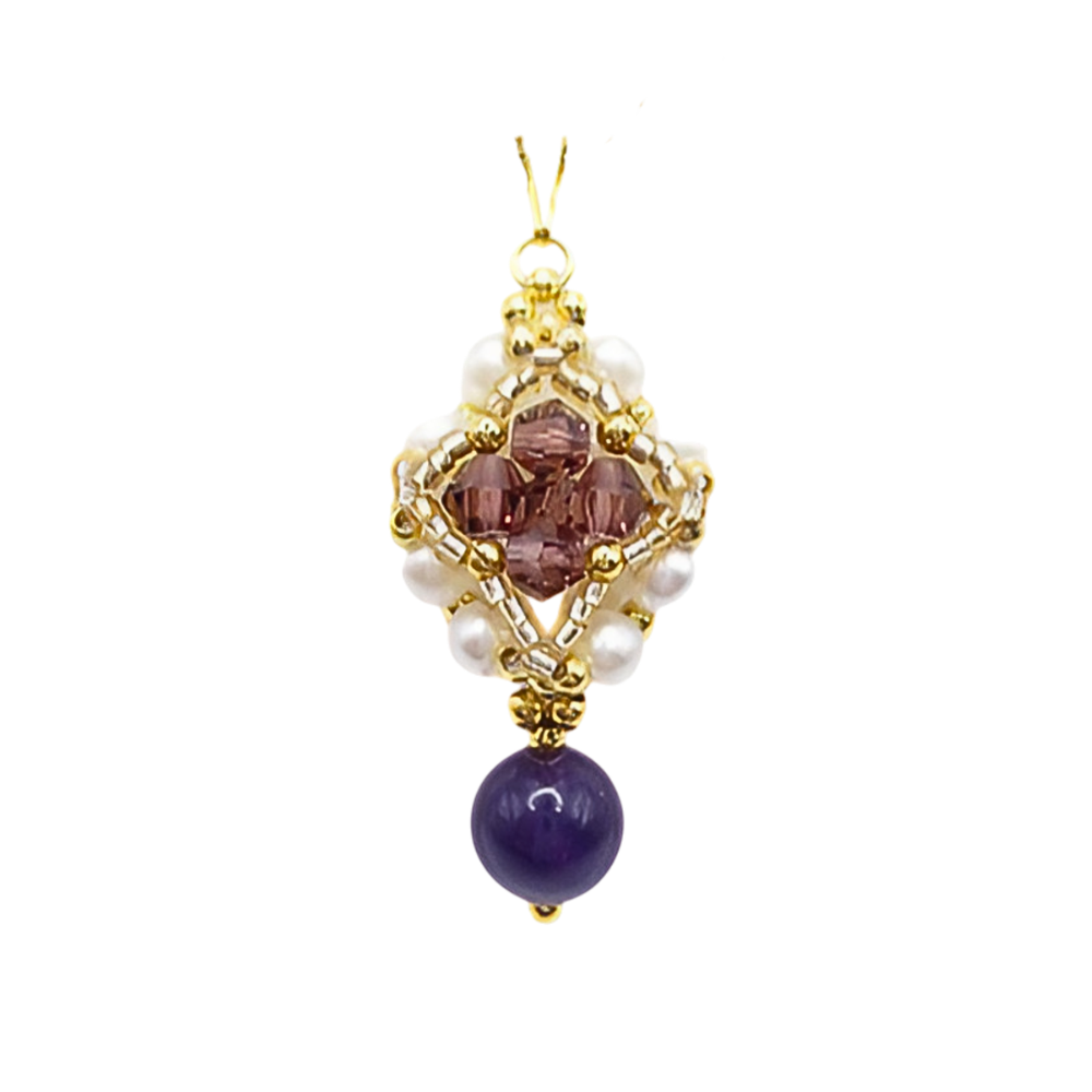 Handmade purple drop pendant featuring a diamond-shaped top section with purple faceted crystals, white freshwater-style pearls and gold seed bead accents, suspending a smooth violet gemstone drop bead, photographed on a white background.