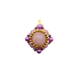 Handmade rose quartz pendant featuring a large smooth round centre stone framed by gold seed beads, pink faceted crystals, vibrant purple pearls and small crystal accents in a diamond-shaped silhouette, with a gold-tone bail, photographed on a white background.