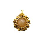 Handmade reversible tourmaline pendant front view featuring a smooth round peach tourmaline centre stone encircled by metallic gold-plated faceted crystals and gold bead accents in a sunburst floral design, with a gold-tone bail, photographed against a white background.