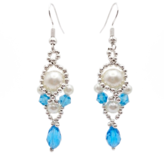 Handmade aquamarine crystal and white pearl dangle earrings with silver-tone beaded frame and teardrop crystal, shown against a white background