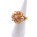 Handmade gold crystal and mocha & champagne pearl cluster ring worn on mannequin finger - beaded dome cocktail ring for women