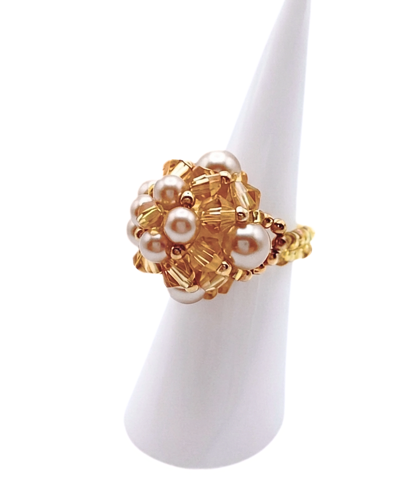 Handmade gold crystal and mocha & champagne pearl cluster ring worn on mannequin finger - beaded dome cocktail ring for women