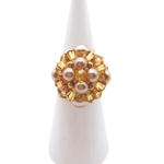 Handmade gold crystal and mocha & champagne pearl cluster cocktail ring on white ring display stand - beaded cocktail ring for women
