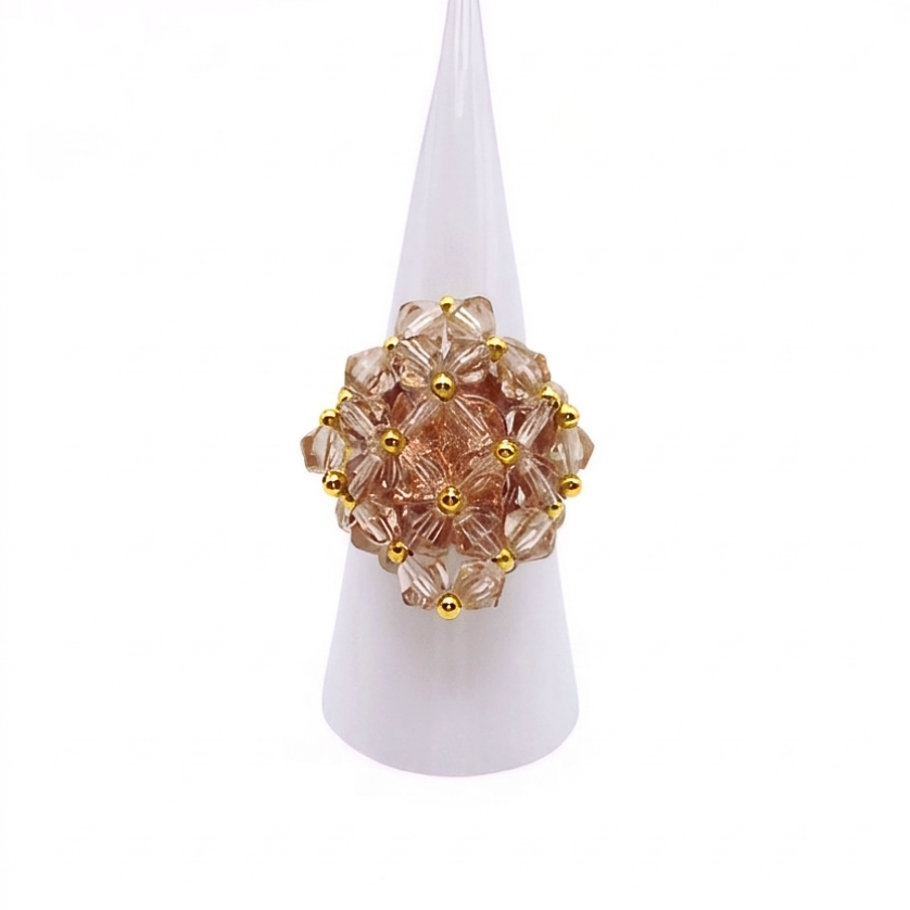 large-champange-cocktail-ring-display Champagne crystal cocktail ring on white cone display stand - handmade beaded cluster ring with gold accent beads and hidden large crystal centre