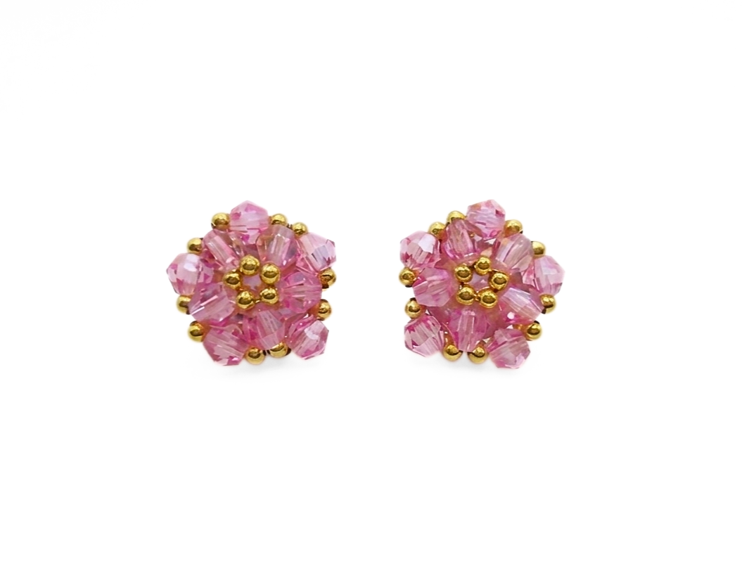 Pink crystal cluster stud earrings with gold-tone accents, handmade star-inspired pentagon design, shown against a white background