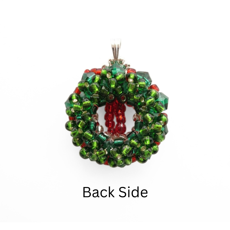 christmas-wreath-pendant-back-side The back side of the Christmas wreath pendant – numerous green beads hand-stitched over green crystals, with silver-lined accents.