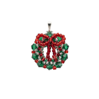 Handcrafted beaded Christmas wreath pendant made with emerald green crystals, red beads, and silver-lined accents, shown against a white background