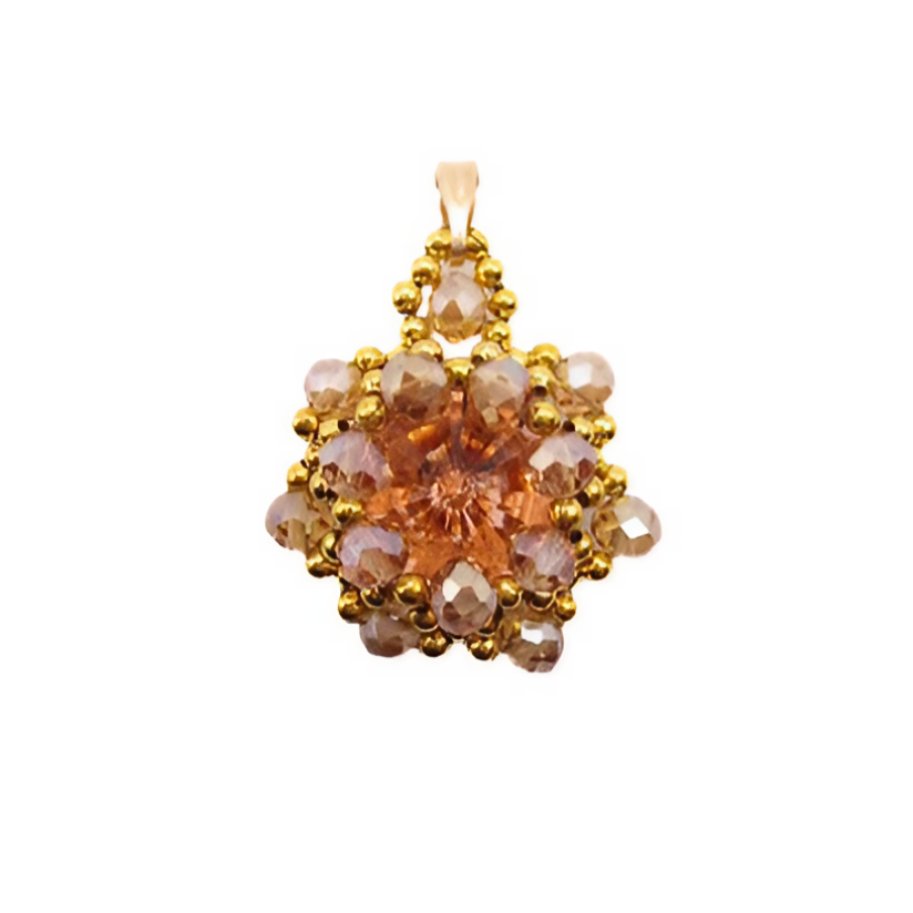 Handmade peach and champagne crystal statement pendant featuring a large faceted peach centre crystal surrounded by champagne crystals and gold coloured beads on a gold-tone chain, photographed against a white background.