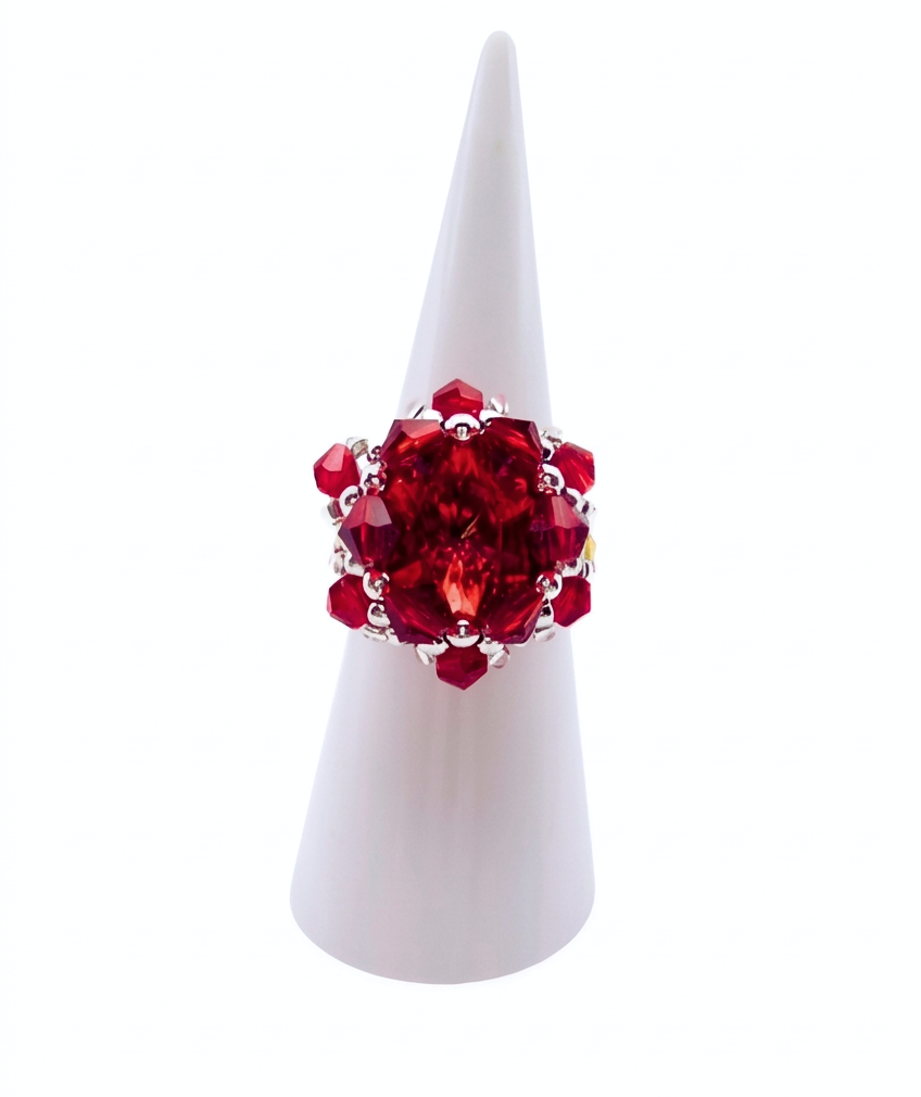 red-cocktail-ring-main Red crystal cluster cocktail ring with large center crystal on white ring cone stand — handmade beaded statement ring