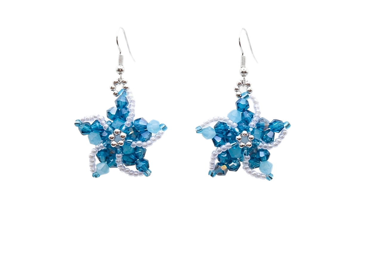 Handmade starfish-shaped beaded earrings featuring pastel blue and ocean blue AB-coated crystal beads with white seed bead edging and silver hook findings, shown as a matching pair on a white background.