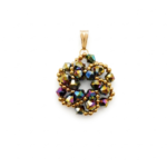 Handmade crystal pendant with iridescent multi-colored metallic beads and gold-coloured accents, displayed against a white background.
