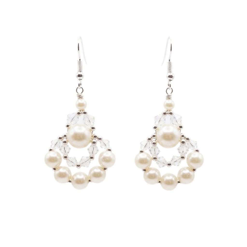 Clear crystal and off-white faux pearl drop earrings with silver-tone detailing, handmade statement pearl earrings on a white background