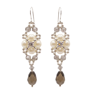 Handmade pearl-beaded earrings with faceted grey crystal teardrop dangle on silver ear wires. Shown against a neutral background.