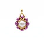 Purple and white pearl pendant necklace with gold beadwork detailing and a matching gold-tone chain shown against a white background
