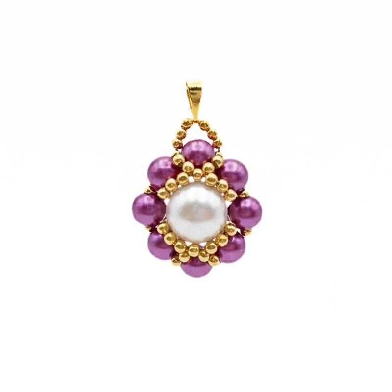 purple-pearl-pendant-thumnail Purple and white pearl pendant necklace with gold beadwork detailing and a matching gold-tone chain shown against a white background