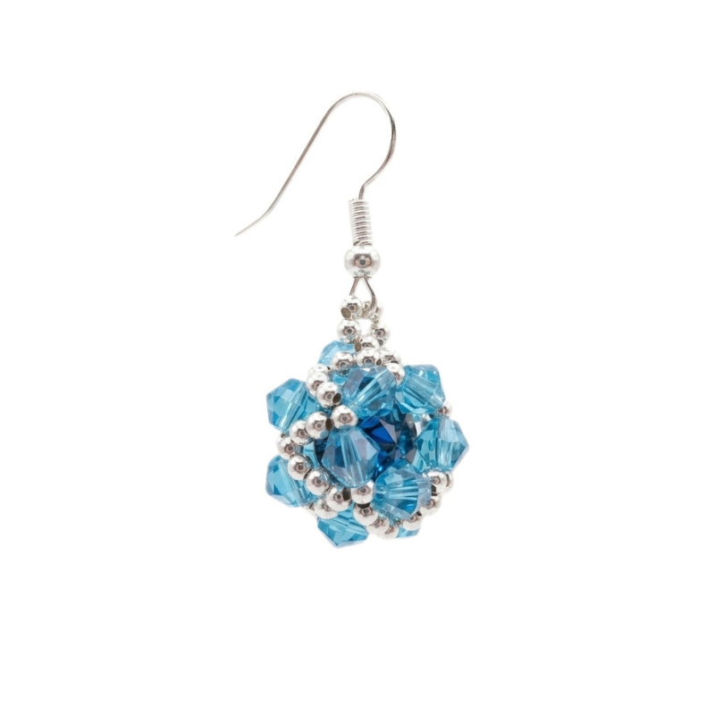 saaphire-crystal-earrings-side-view A side view of a sapphire blue and aquamarine crystal cluster earring with silver beaded detail and silver hooks. Shown against a white background.
