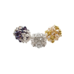 Three barrel-shaped handmade crystal and pearl pendants in amethyst purple, smoke grey and champagne gold -Shown against a white background.